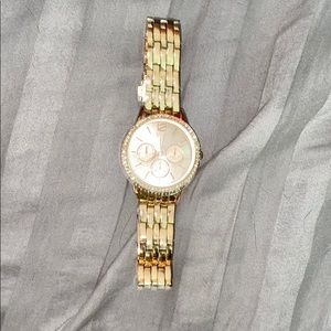 Gold colored watch